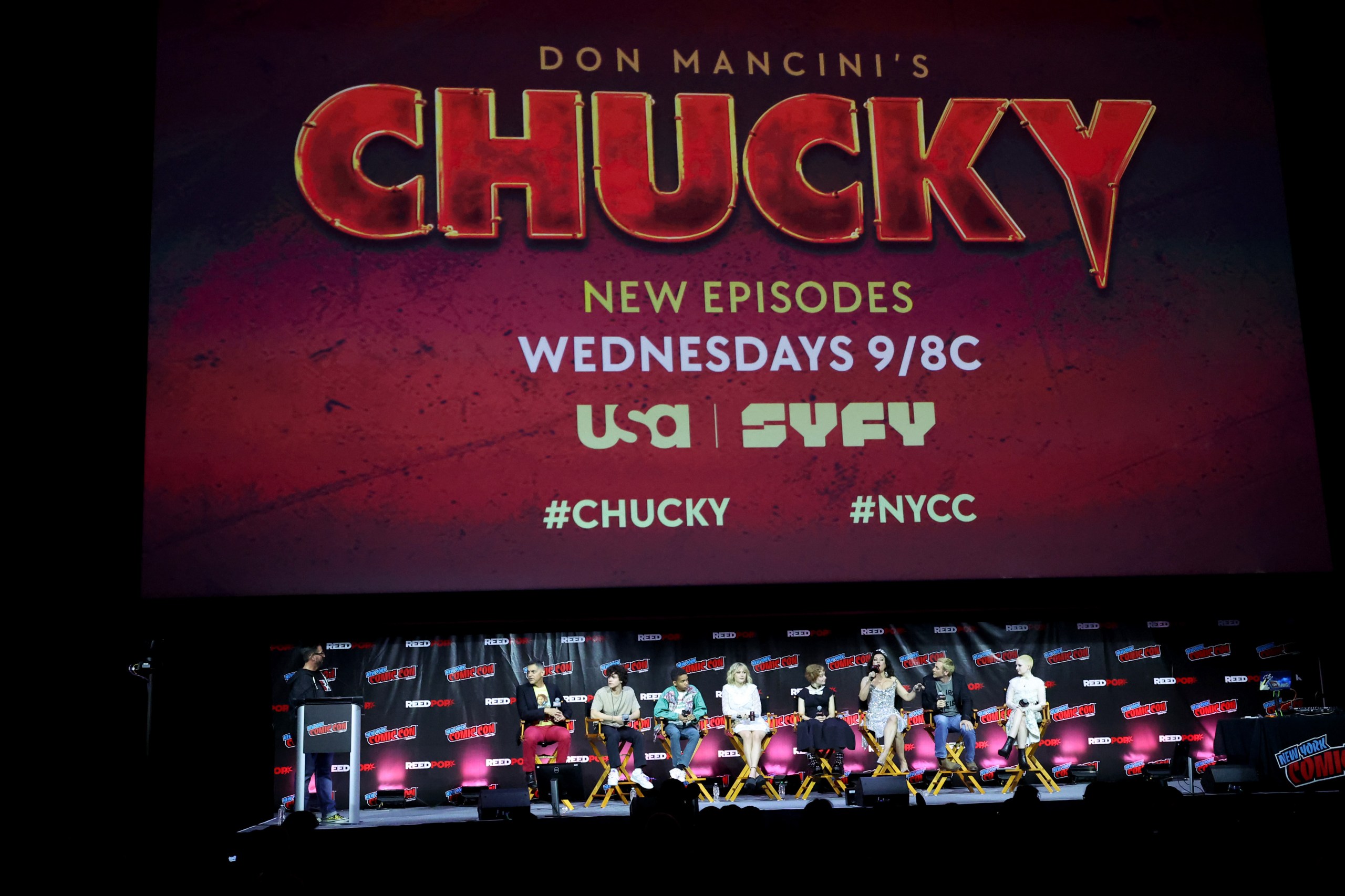 Don Mancini, Jennifer Tilly, Devon Sawa, and the Chucky Season 2 cast speaking onstage at New York Comic Con 2022