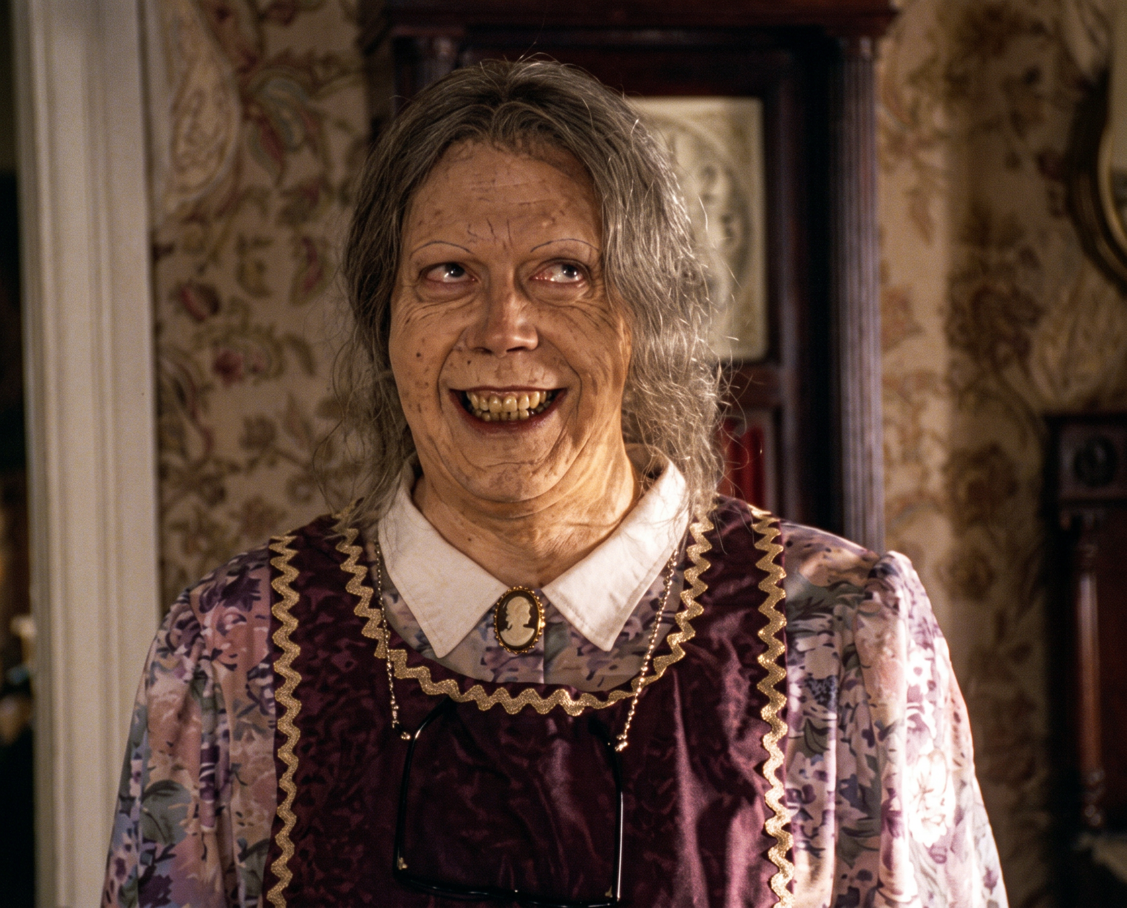 Tim Curry in costume as the murderous Brackett family characters from the 1993 Tales from the Crypt episode "Death of Some Salesmen"