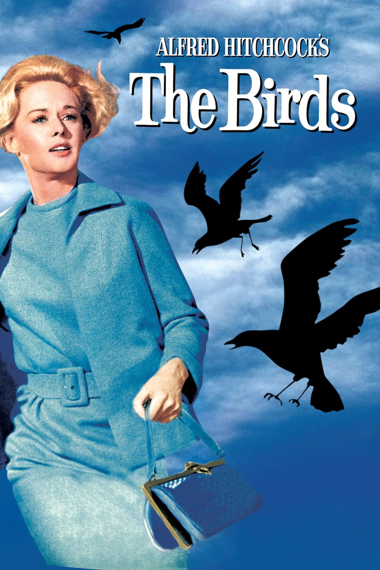 Movie poster for Alfred Hitchcock's The Birds (1963) showing a blonde woman in a blue coat holding a purse, surrounded by large black bird silhouettes in a cloudy sky.