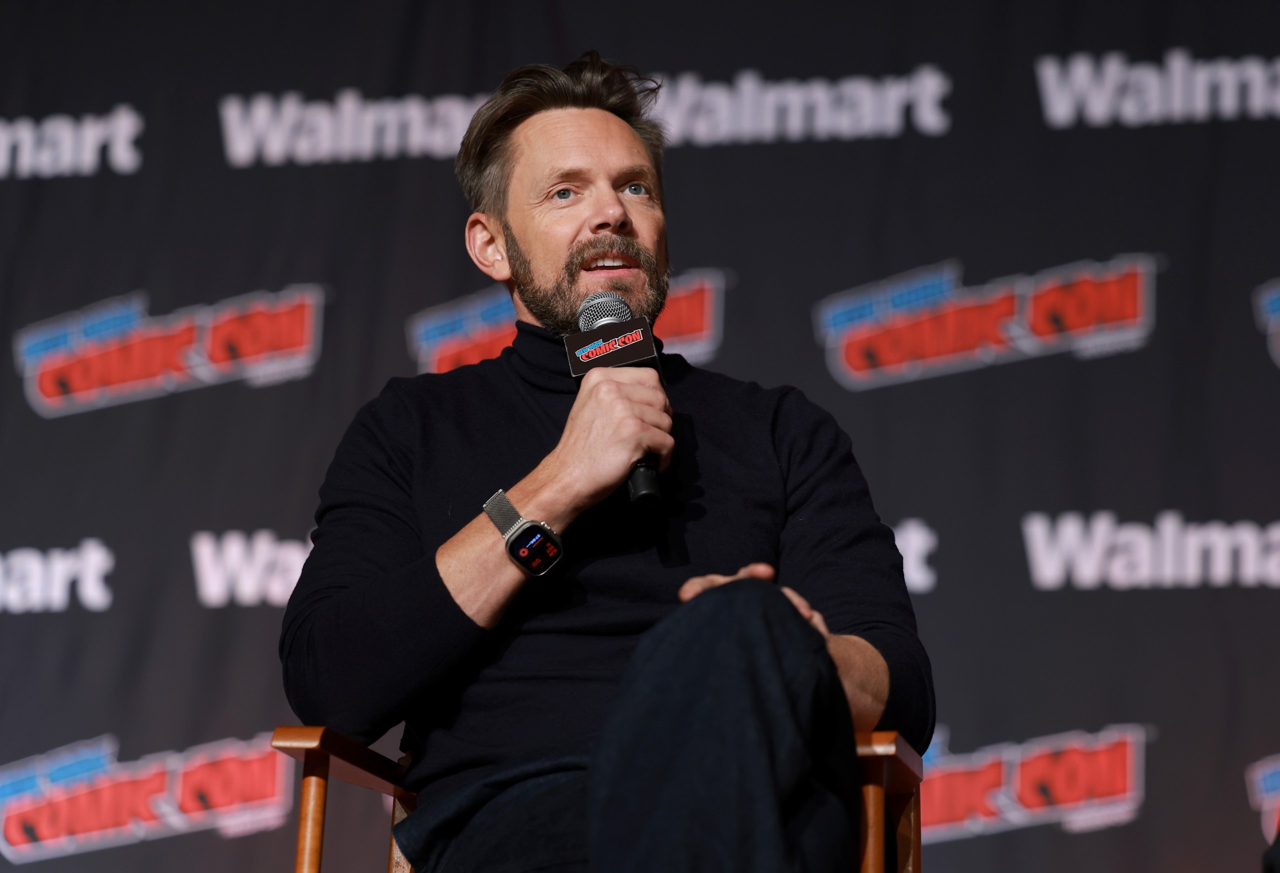 Joel McHale speaking on a panel at New York Comic Con 2026 at the Javits Center