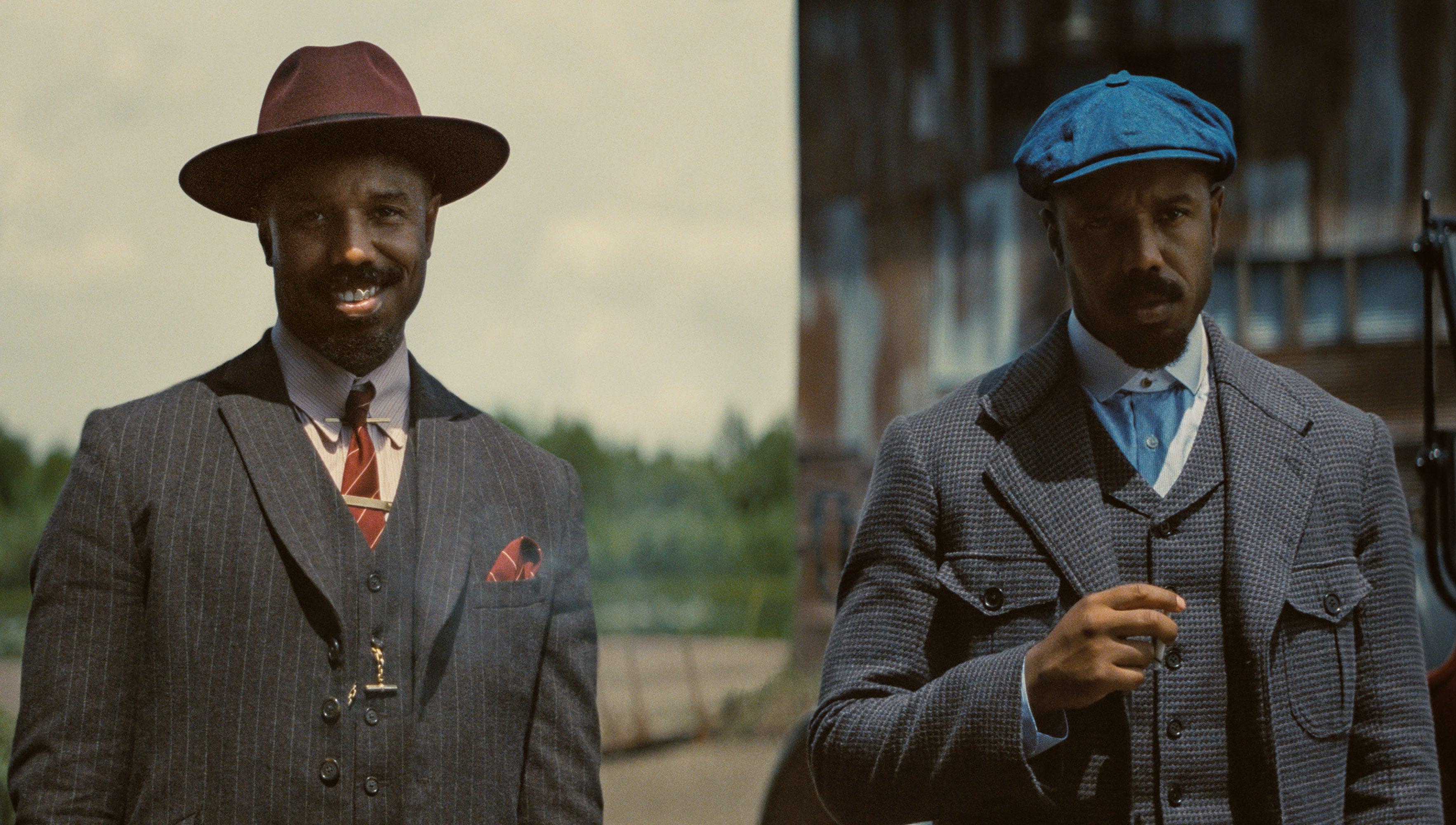 Side-by-side still of Michael B. Jordan as twin brothers: left in a pinstripe suit and wide-brim burgundy hat, right in a houndstooth coat and blue flat cap.