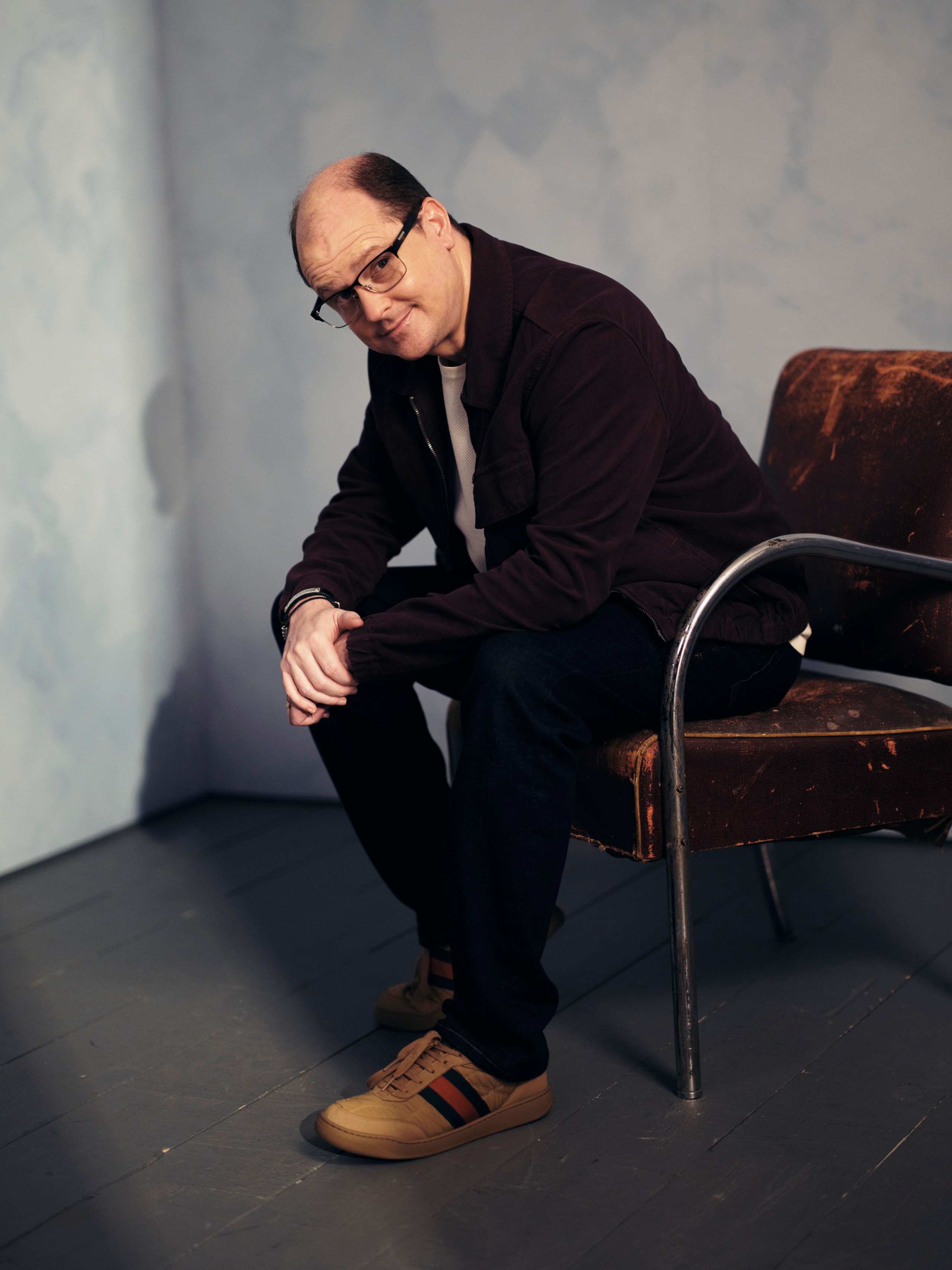 Mike Flanagan posing in a portrait studio at the InterContinental Toronto Centre