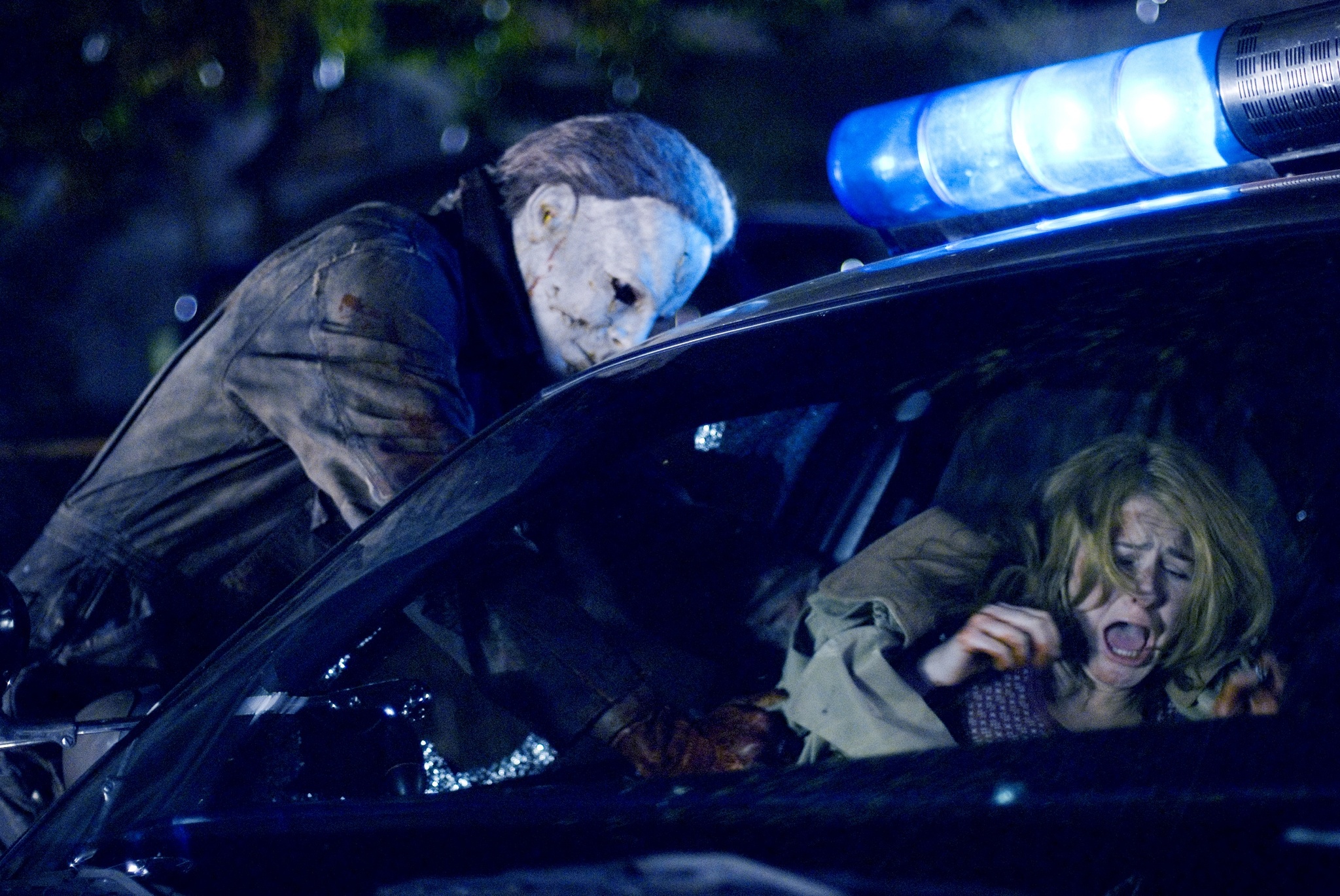 Tyler Mane (Michael Myers) and Scout Taylor-Compton (Laurie Strode) star in Rob Zombie's Halloween.