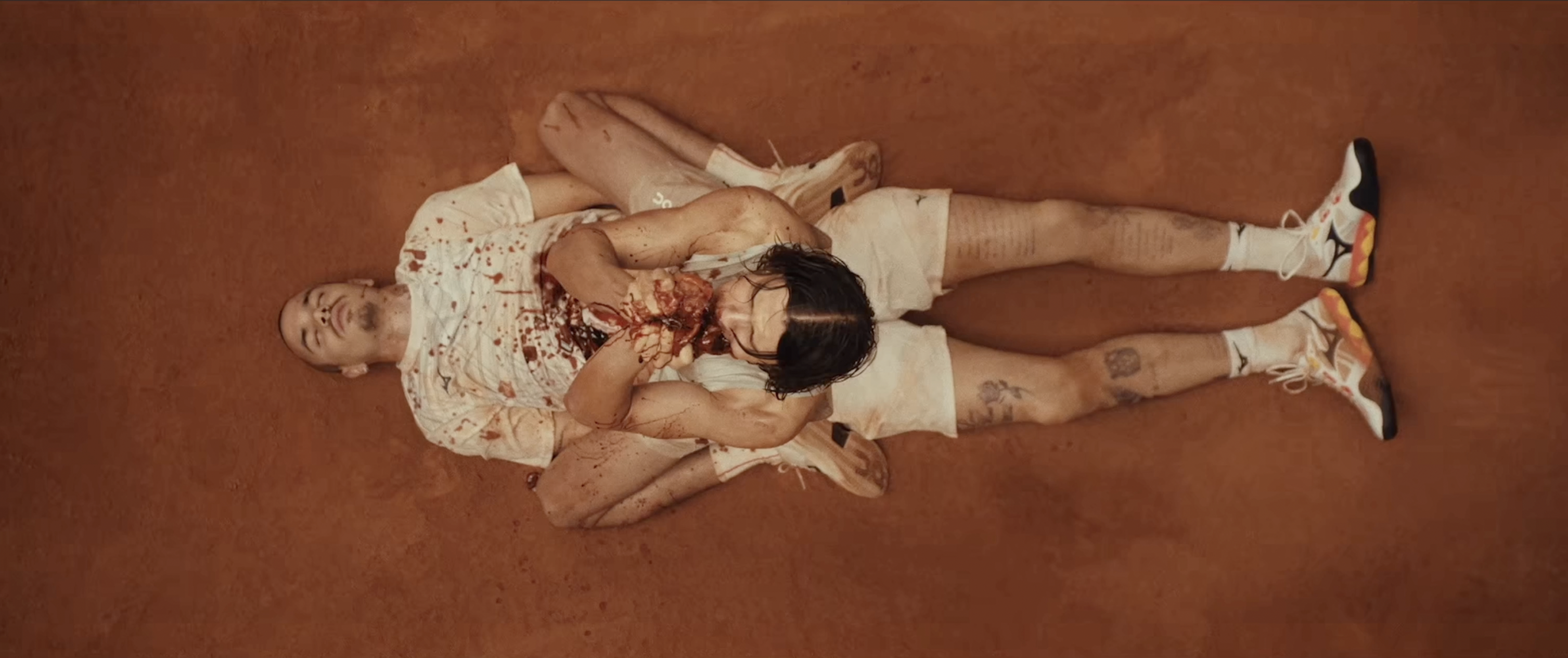 A still from the film Forty Love featuring Romeo Beckham and Paul Kircher