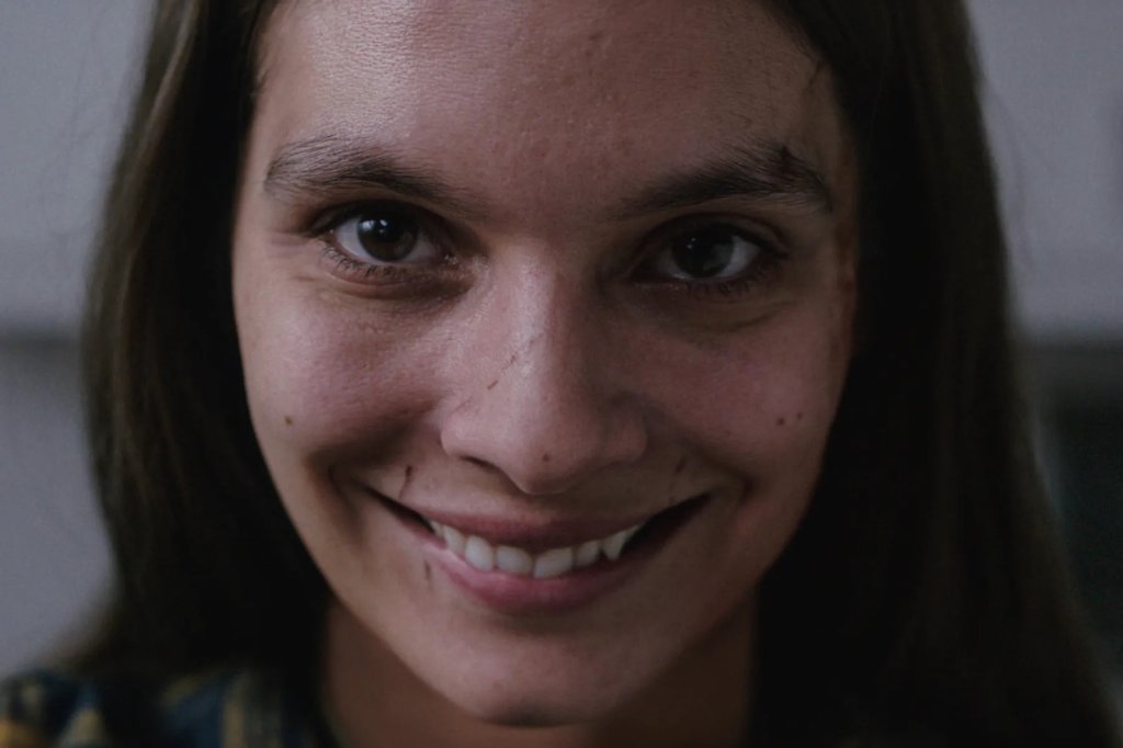 Caitlin Stasey in a scene from the 2022 horror film Smile