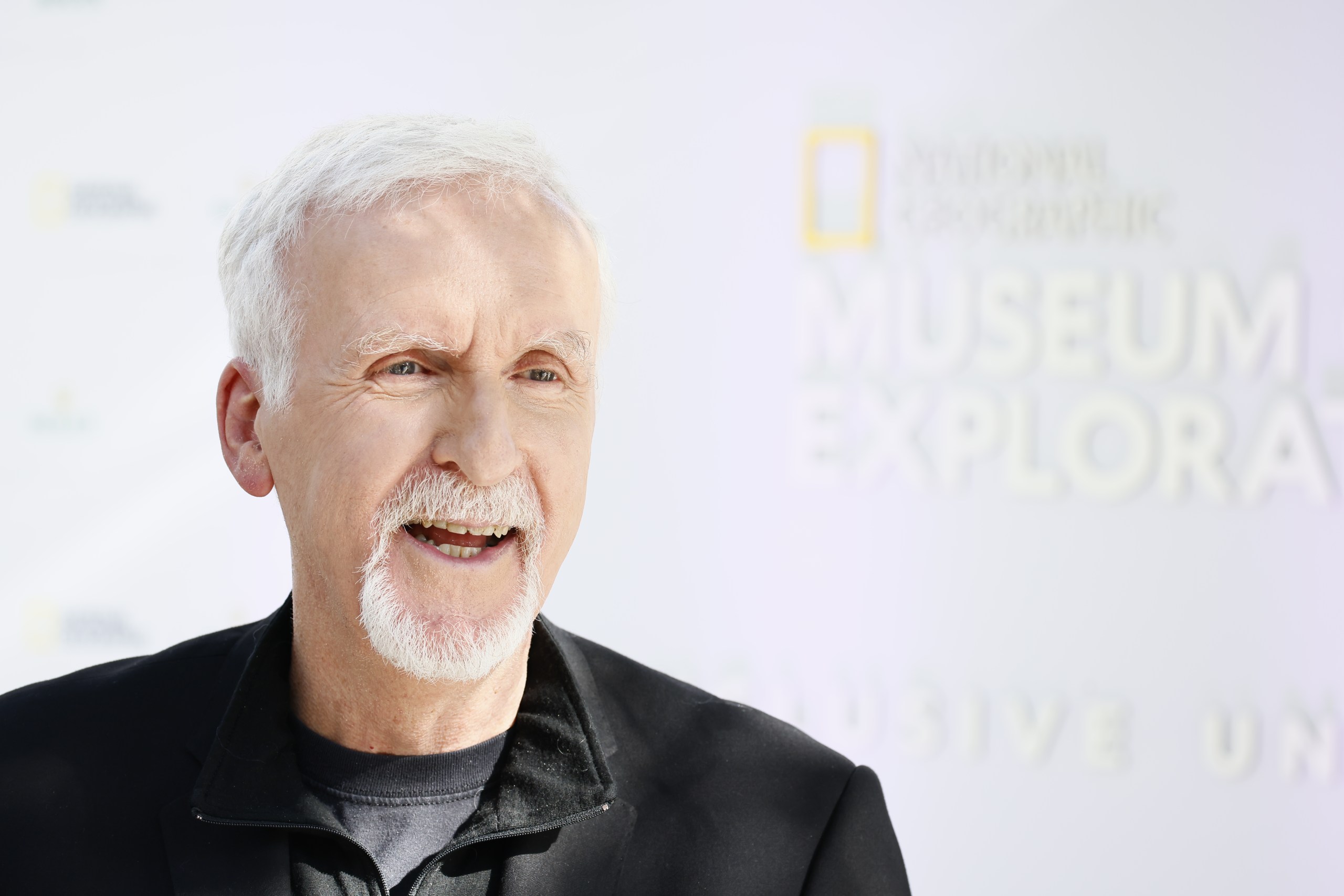James Cameron standing at the unveiling of the National Geographic Museum of Exploration in Washington, DC