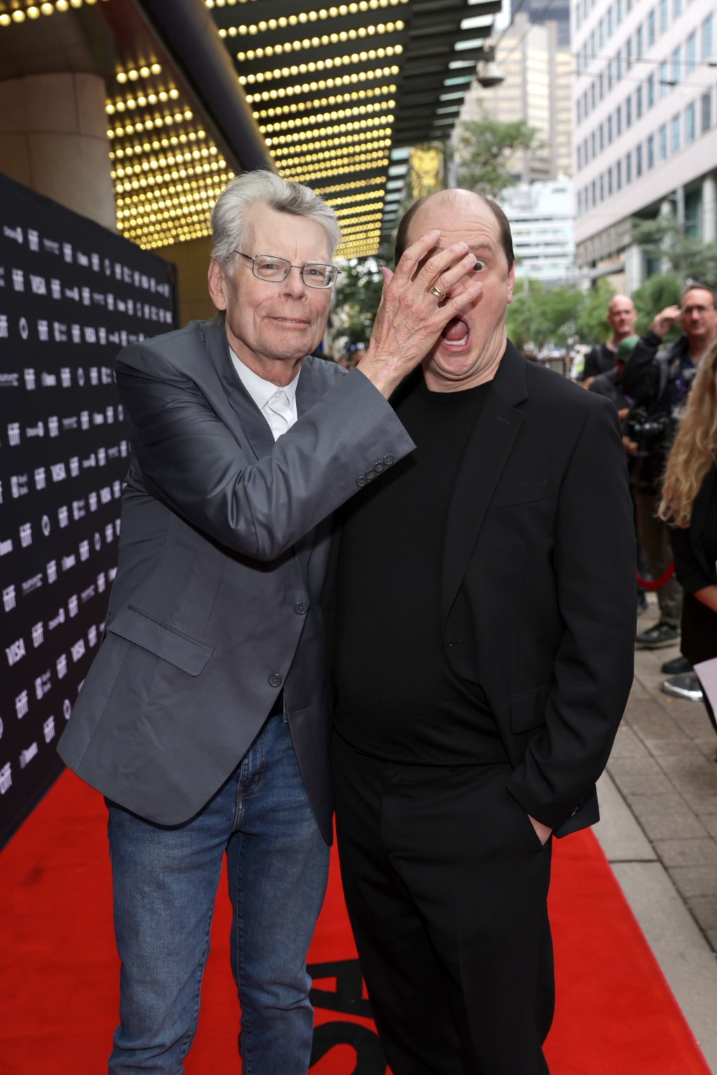 Stephen King and Mike Flanagan standing together at the Toronto International Film Festival premiere of "The Life of Chuck"