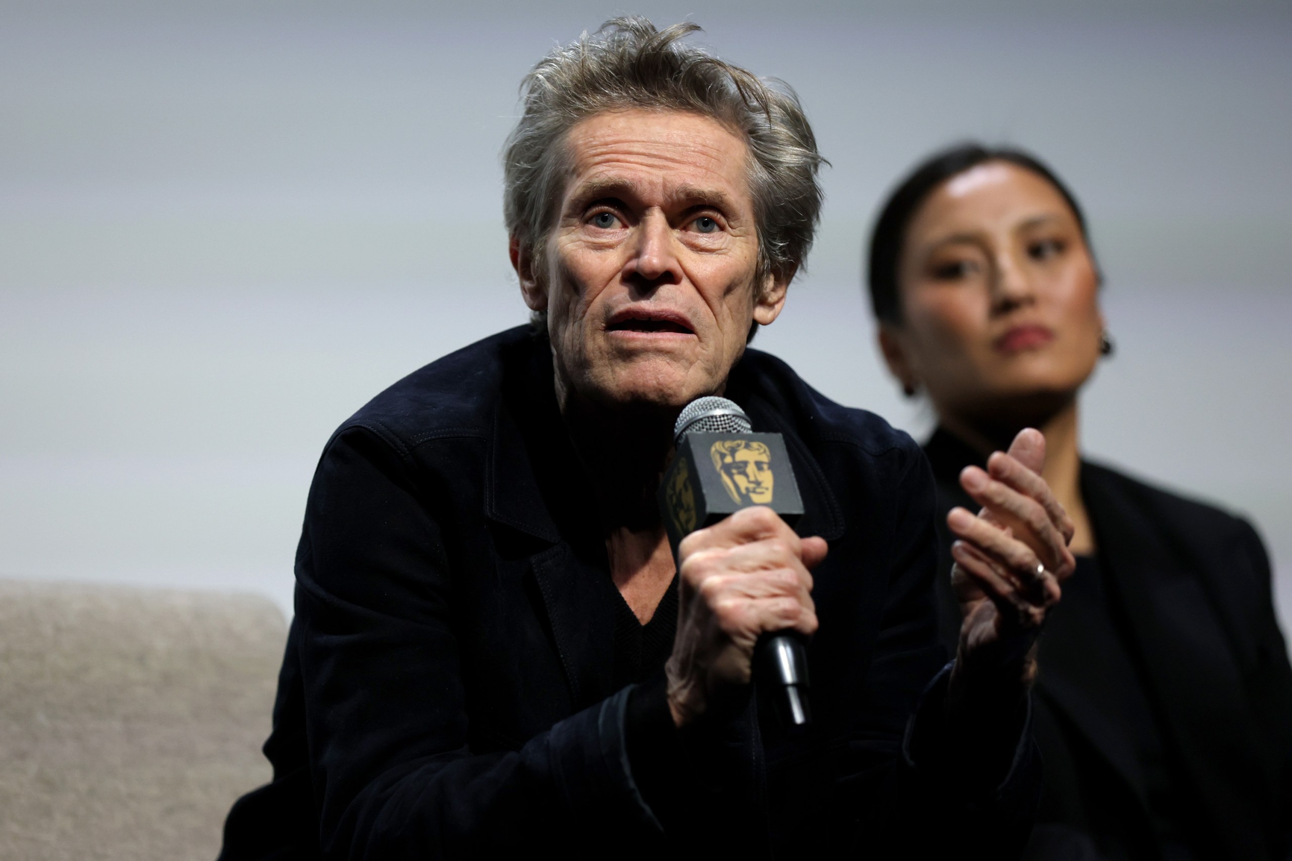 Willem Dafoe speaking onstage at the BAFTA New York screening of Tenzing at the Whitby Hotel